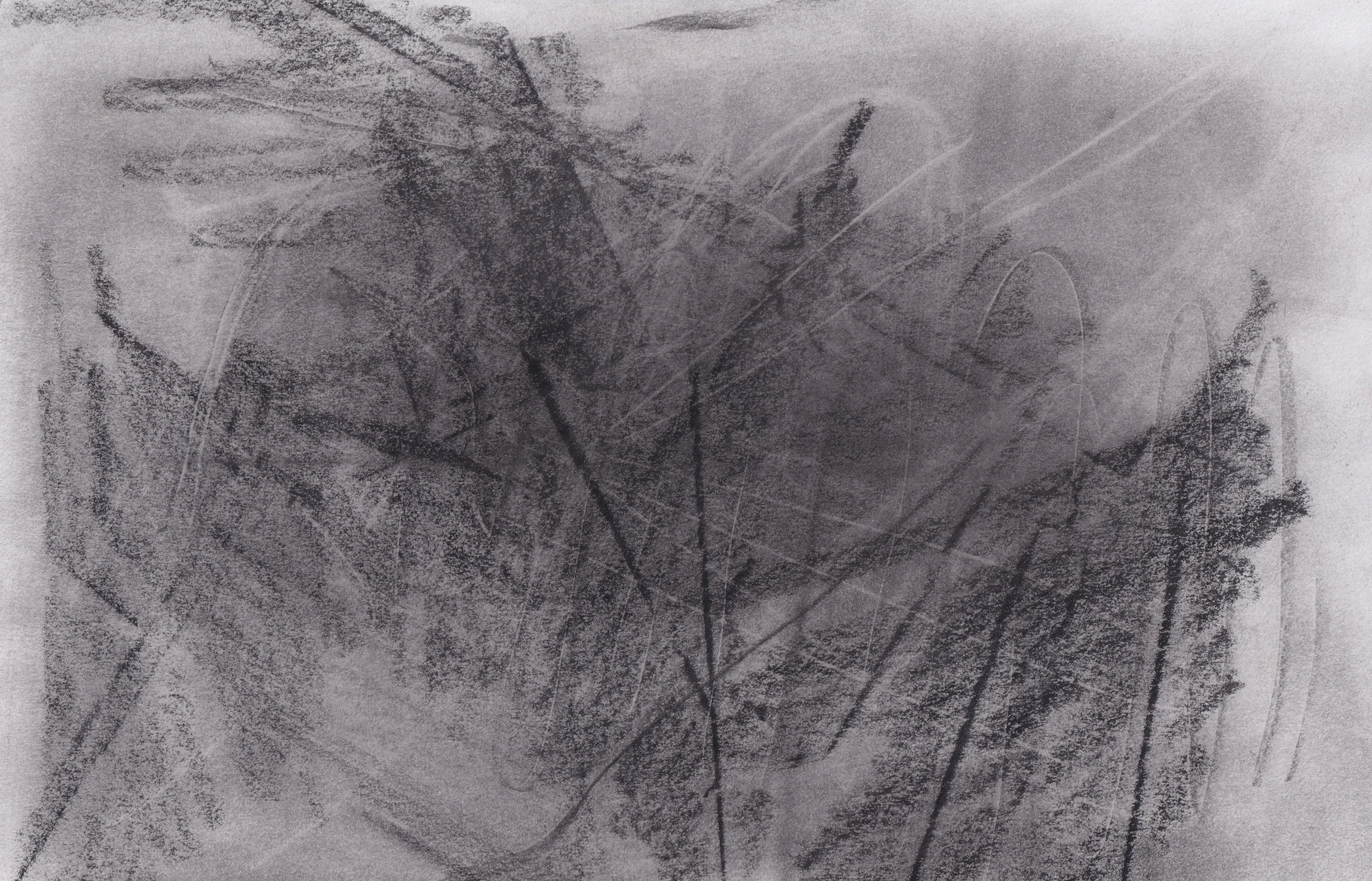 Heavy dark graphite hatching on white paper, crossed by thin straight lines, with a lighter haze at upper right